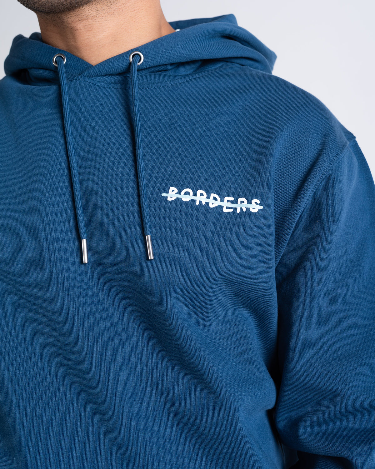 Hoodie «Borders» Petrol: Detail des Motivs