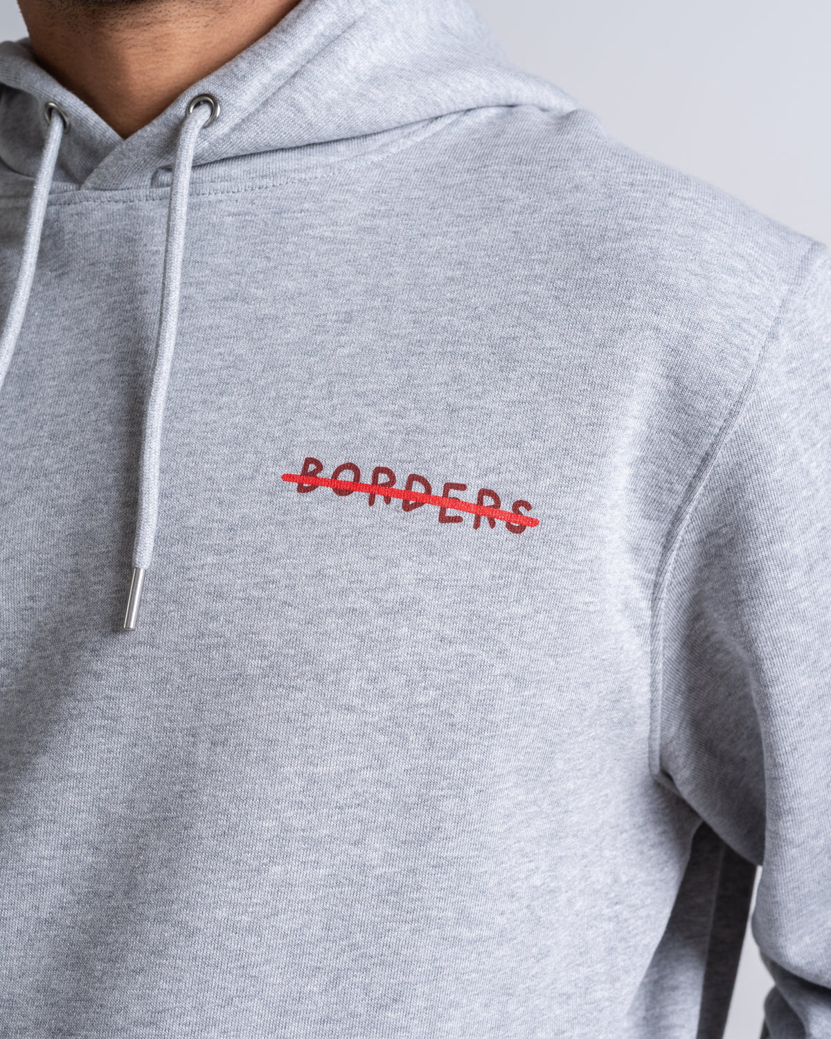 Hoodie «Borders» Hellgrau meliert: Detail des Motivs
