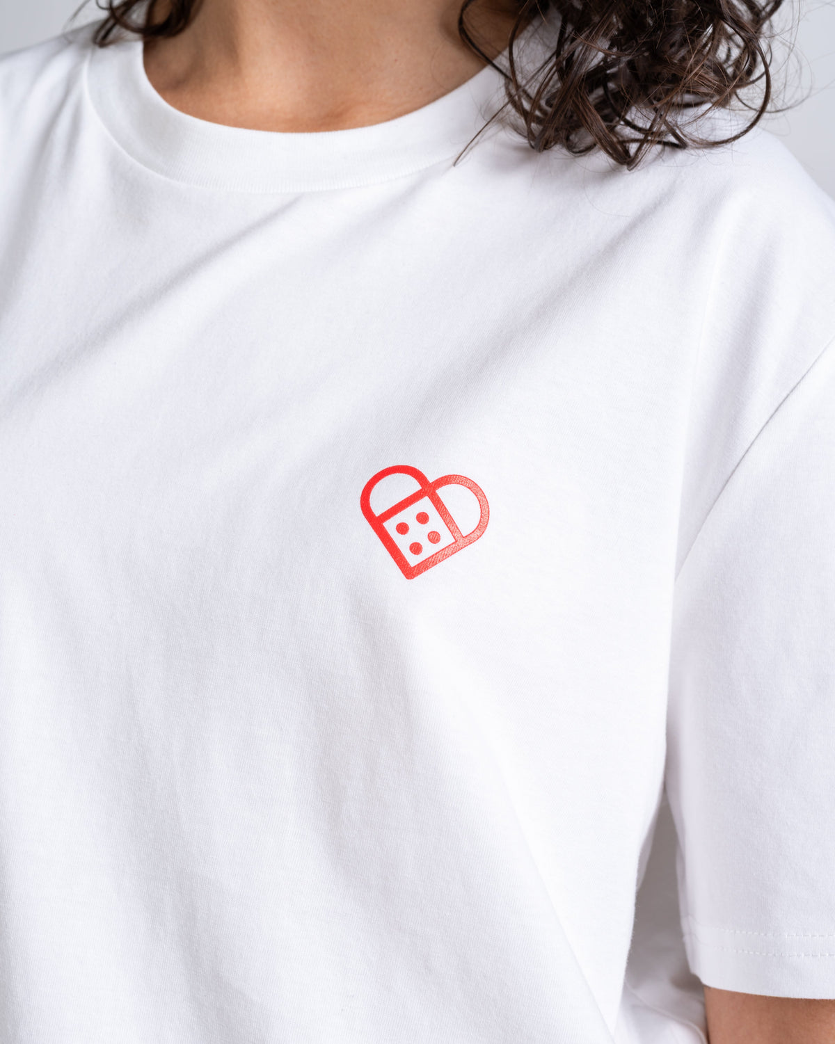 T-Shirt «Daily Dosage» Naturweiß: Detail des Motivs
